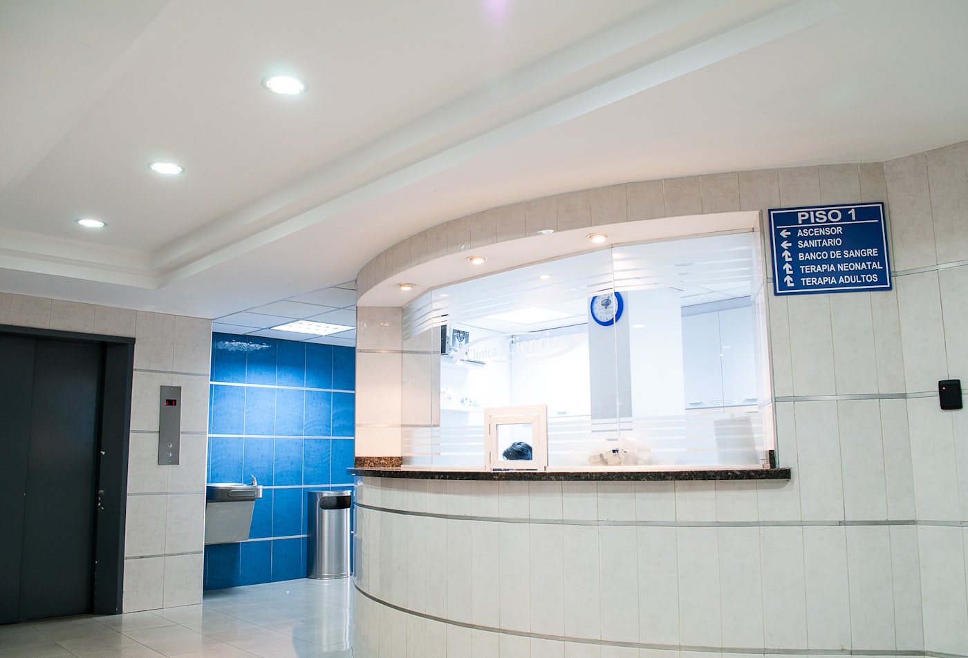 Modern healthcare reception area with a clean front desk