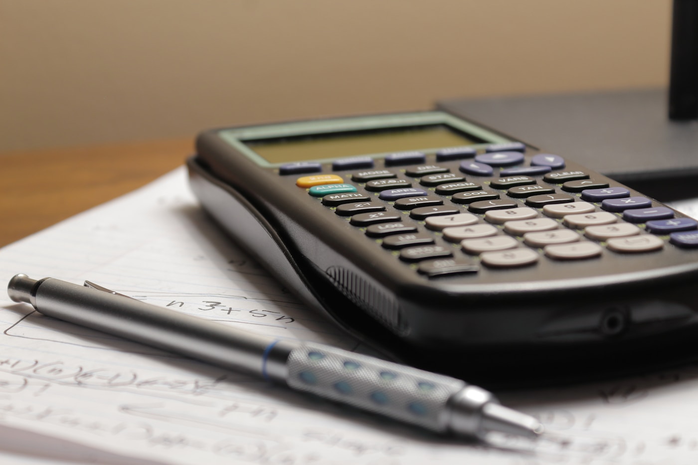 Business owner reviewing accounting notes and planning documents