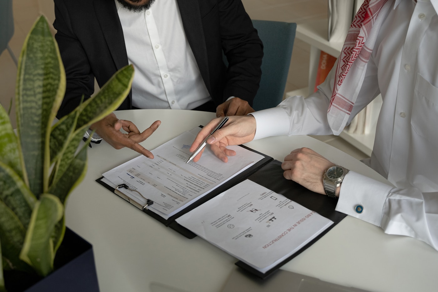 CPA advisor reviewing financial documents with a business owner