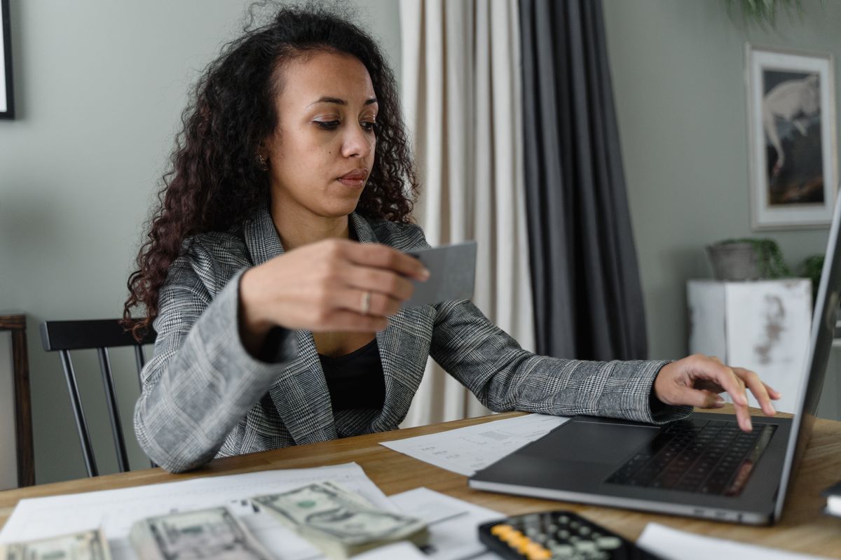 Professional reading and reviewing a tax notice at a desk