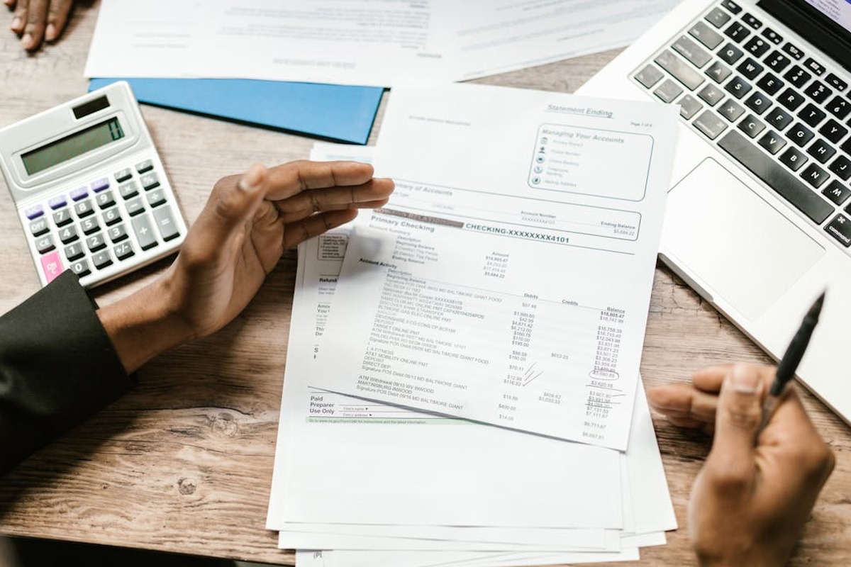 Payroll paperwork and employee records prepared for review